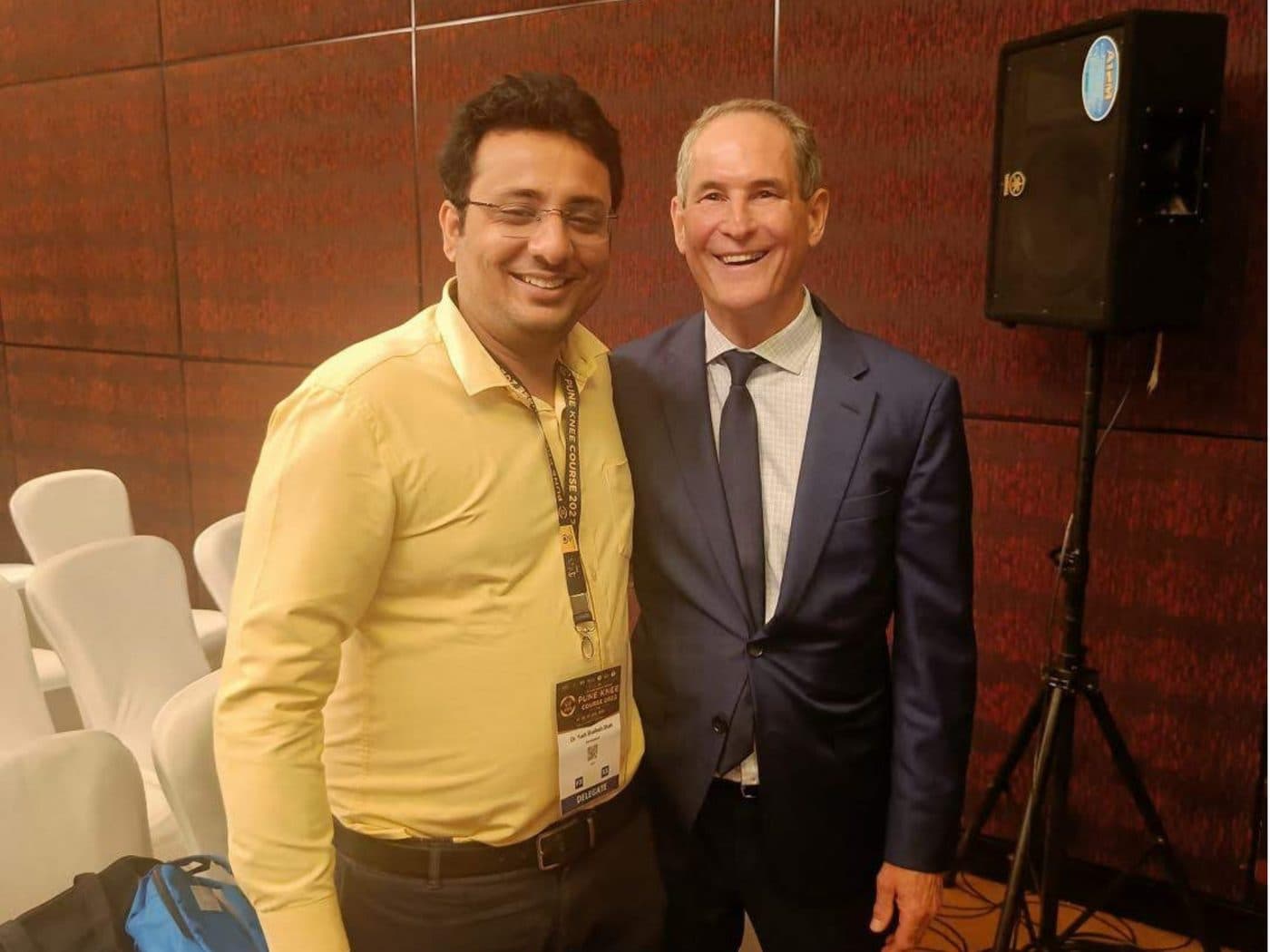 Dr. Yash Shah with a fellow Orthopaedic Surgeon at a conference